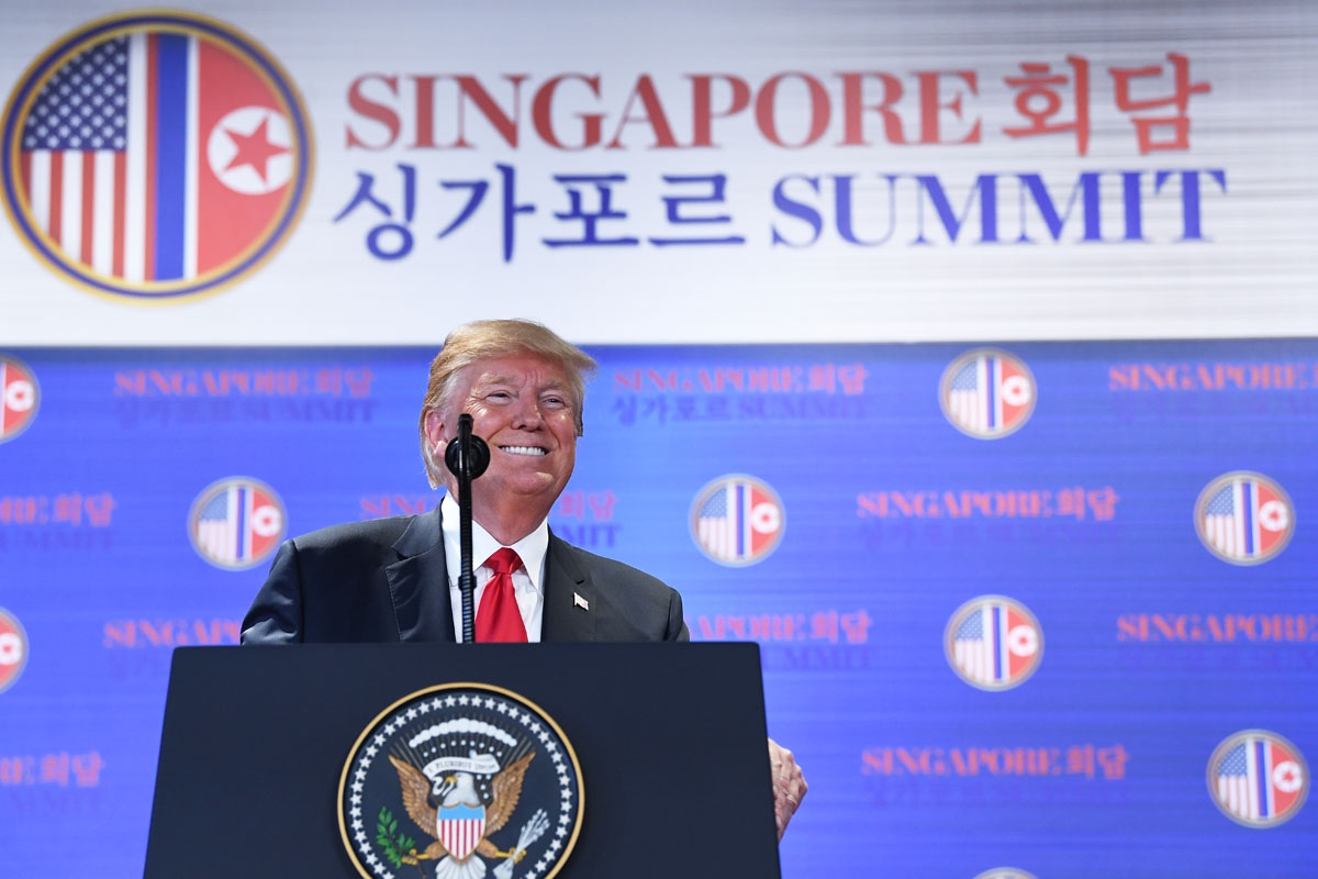US President Donald Trump speaks at a press conference following the historic US-North Korea summit in Singapore on June 12, 2018.