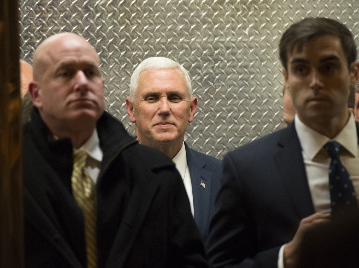 Vice President-elect Mike Pence arrives at Trump Tower for meetings with President-elect Donald Trump November 17, 2016. / AFP PHOTO / Don EMMERT