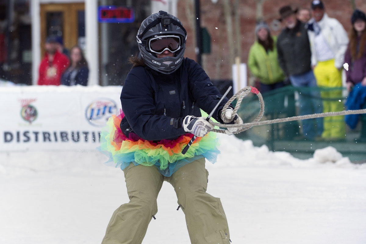 Skier Erika Hall of Buena Vista, Colorado races down Harrison Avenue during the 68th annual Leadville Ski Joring weekend competition on March 5, 2017 in Leadville, Colorado.