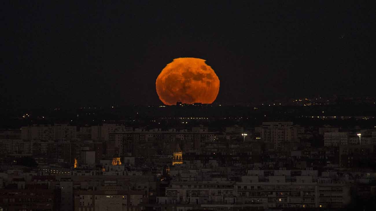 A supermoon rises over Sevilla on November 14, 2016.