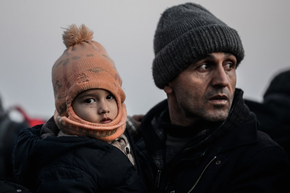 Migrant father and child. January 27, 2016. Migrant father and child. January 27, 2016.