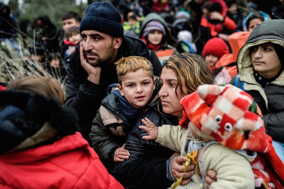 Migrants wait in the woods after being cheated by smugglers. January 29, 2016. Migrants wait in the woods after being cheated by smugglers. January 29, 2016.