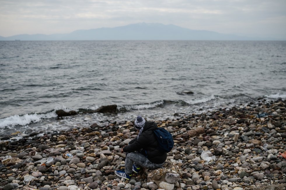 A Syrian migrant looks out onto the sea after being stopped by Turkish police in his attempt to reach the Greek island of Lesbos. January 29, 2016. A Syrian migrant looks out onto the sea after being stopped by Turkish police in his attempt to reach the Greek island of Lesbos. January 29, 2016.