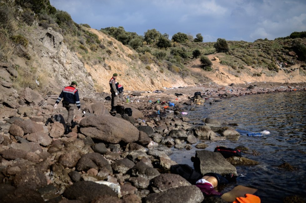 Turkish police look for bodies on a beach. January 30, 2016. Turkish police look for bodies on a beach. January 30, 2016.