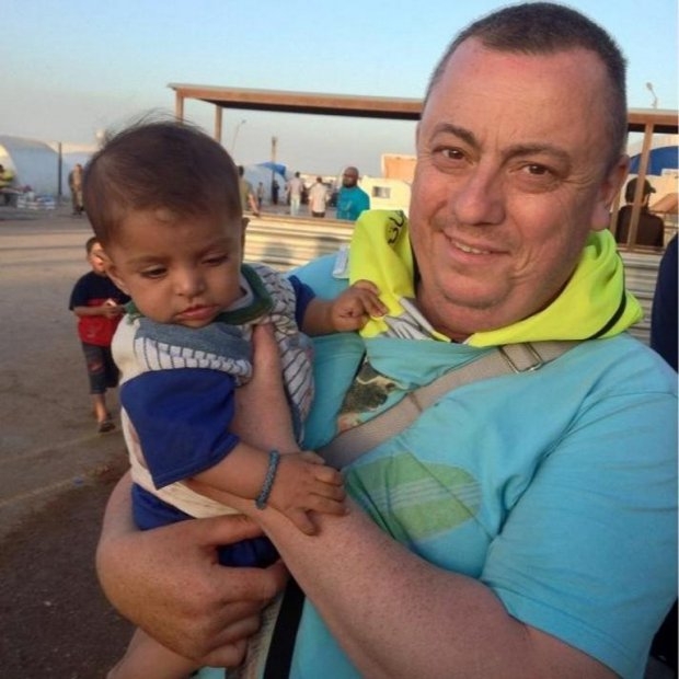 British aid worker Alan Henning, currently held by IS militants and threatened with execution, in a refugee camp on the Turkish-Syrian border at an undisclosed date British aid worker Alan Henning, currently held by IS militants and threatened with execution, in a refugee camp on the Turkish-Syrian border at an undisclosed date