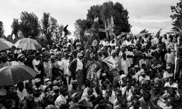 This photo, taken October 16, 2001, in Runda shows residents gathering on a hillside for a gacaca session, where detainees accused of crimes committed during the genocide are confronted by members of the local community. This photo, taken October 16, 2001, in Runda shows residents gathering on a hillside for a gacaca session, where detainees accused of crimes committed during the genocide are confronted by members of the local community.
