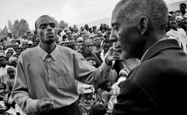 A Rwandan civilian publicly confronts an inmate during a gacaca session, October 16, 2001. A Rwandan civilian publicly confronts an inmate during a gacaca session, October 16, 2001.