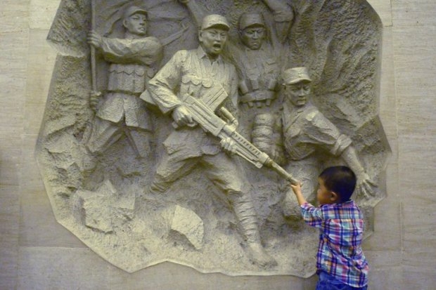 A boy visits China's Anti-Japanese War museum at the Marco Polo bridge, or Lugouqiao, in west Beijing on July 7, 2014. A boy visits China's Anti-Japanese War museum at the Marco Polo bridge, or Lugouqiao, in west Beijing on July 7, 2014.