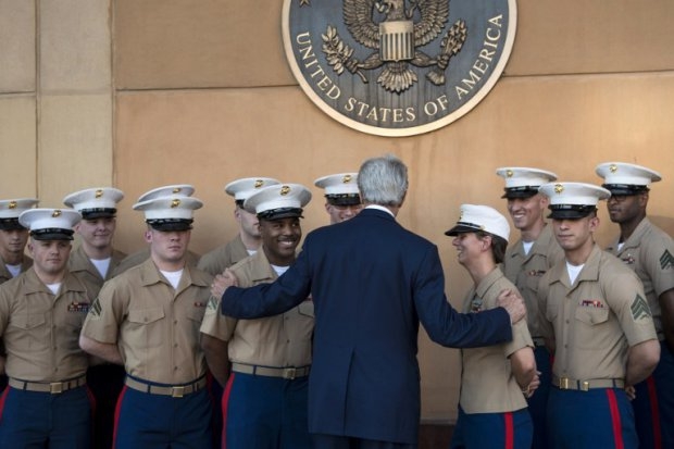 US Secretary of State John Kerry greets US marines as he arrives at the US embassy in the International Zone June 23, 2014 in the Iraqi capital Baghdad. US Secretary of State John Kerry greets US marines as he arrives at the US embassy in the International Zone June 23, 2014 in the Iraqi capital Baghdad.