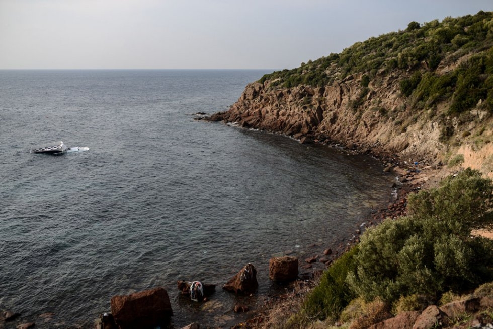A boat that capsized with migrants aboard is seen off the coast of Turkey on January 31, 2016. A boat that capsized with migrants aboard is seen off the coast of Turkey on January 31, 2016.