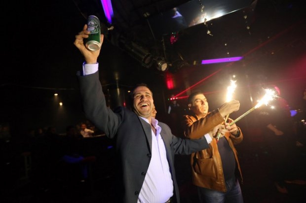 Syrians dance at a night club in the government-controlled part of the northern city of Aleppo on November 15, 2014. Syrians dance at a night club in the government-controlled part of the northern city of Aleppo on November 15, 2014.