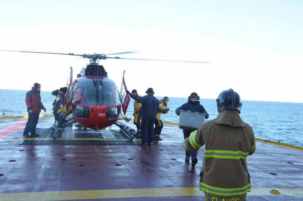 Scientists unload biological samples on the CCGS Amundsen Scientists unload biological samples on the CCGS Amundsen