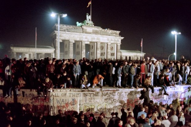 Thousands of young East Berliners crowd atop the Berlin Wall, near the Brandenburg Gate on November 11, 1989 Thousands of young East Berliners crowd atop the Berlin Wall, near the Brandenburg Gate on November 11, 1989