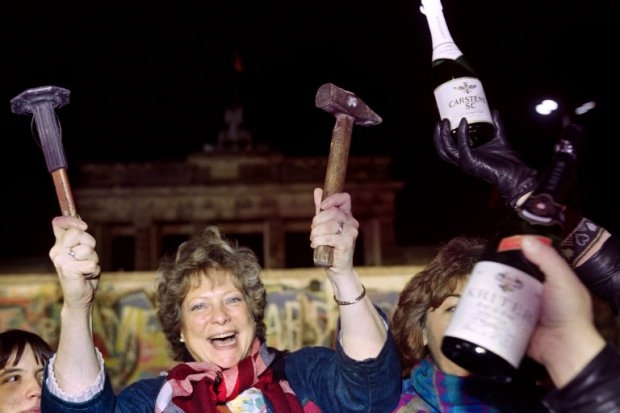 Berliners party in front of the Wall at the Brandenburg Gate on November 15, 1989 Berliners party in front of the Wall at the Brandenburg Gate on November 15, 1989