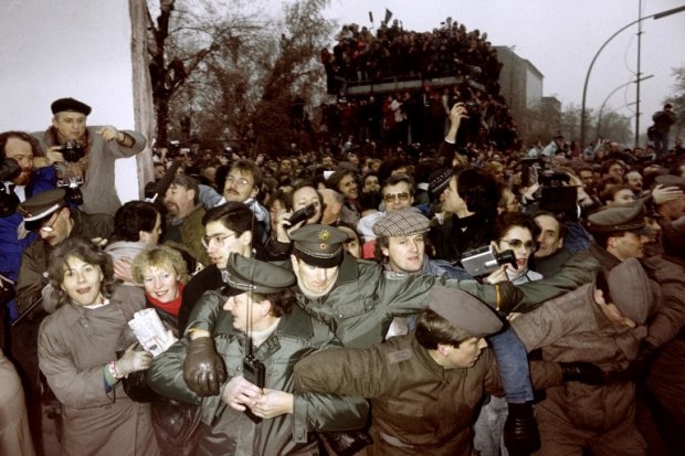 East and West German Police contain the crowd of East Berliners flowing through the recent opening made in the Berlin wall at Potsdamer Square, on November 12, 1989 East and West German Police contain the crowd of East Berliners flowing through the recent opening made in the Berlin wall at Potsdamer Square, on November 12, 1989
