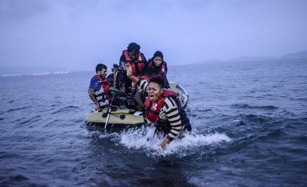 An African migrant tries to come back to the shore after failing to board a boat to Kos on early August 16, 2015 off the shore of Bodrum, southwest Turkey An African migrant tries to come back to the shore after failing to board a boat to Kos on early August 16, 2015 off the shore of Bodrum, southwest Turkey