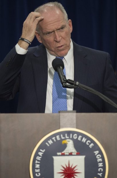 CIA director John Brennan takes questions from reporters on December 11, 2014 CIA director John Brennan takes questions from reporters on December 11, 2014