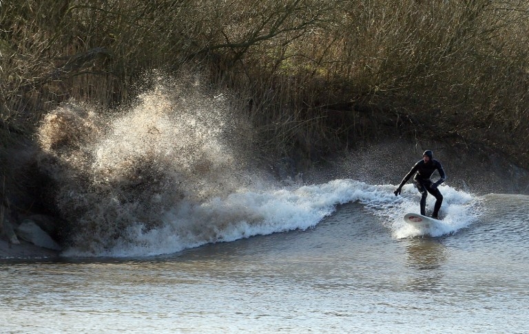 Riding the Severn bore at Minsterworth, southwest England on March 21, 2015 Riding the Severn bore at Minsterworth, southwest England on March 21, 2015