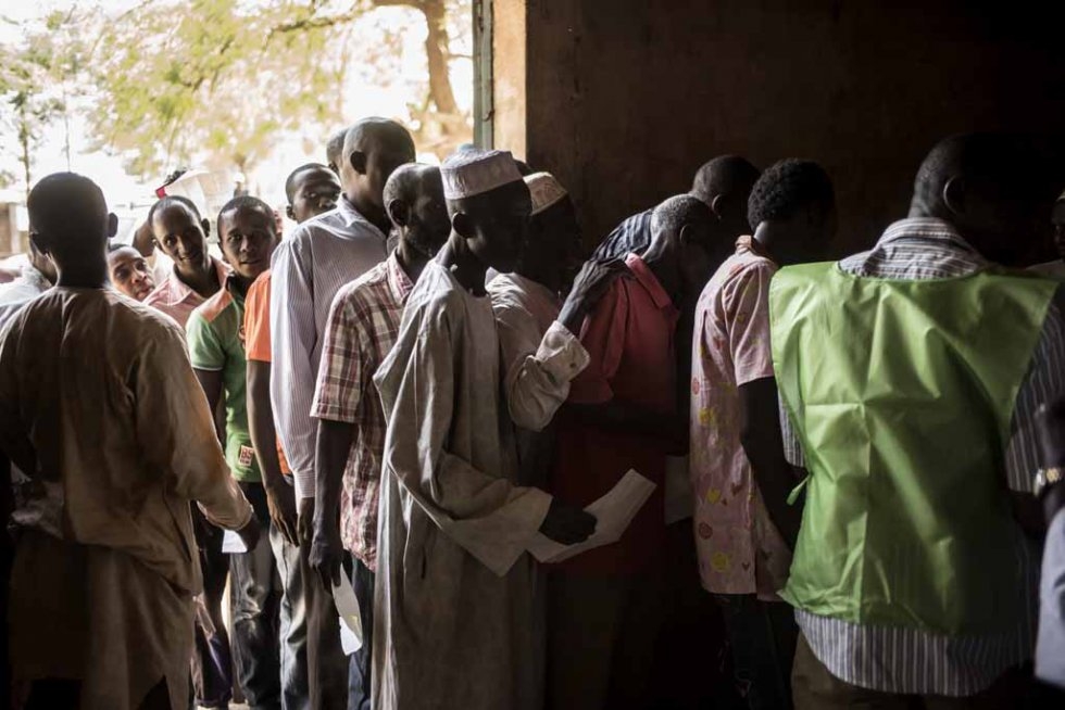 Voters cast ballots a day after the violence. Voters cast ballots a day after the violence.