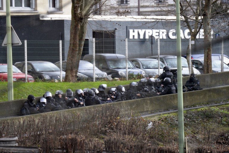 Police forces taking position by the Hyper Cacher kosher grocery store Police forces taking position by the Hyper Cacher kosher grocery store