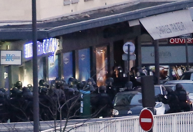 Special forces launch the assault in Porte de Vincennes, east Paris, on January 9, 2015 Special forces launch the assault in Porte de Vincennes, east Paris, on January 9, 2015