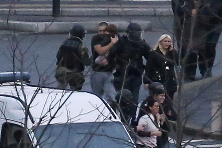 Special forces evacuate hostages in Porte de Vincennes, Paris, on January 9, 2015 Special forces evacuate hostages in Porte de Vincennes, Paris, on January 9, 2015