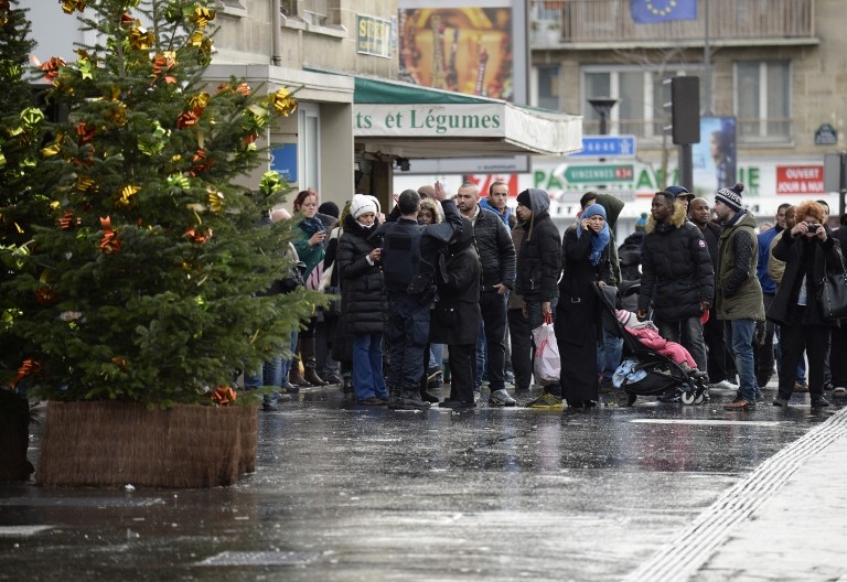 Police instruct local residents in Porte de Vincennes during the hostage siege on January 9, 2015 Police instruct local residents in Porte de Vincennes during the hostage siege on January 9, 2015