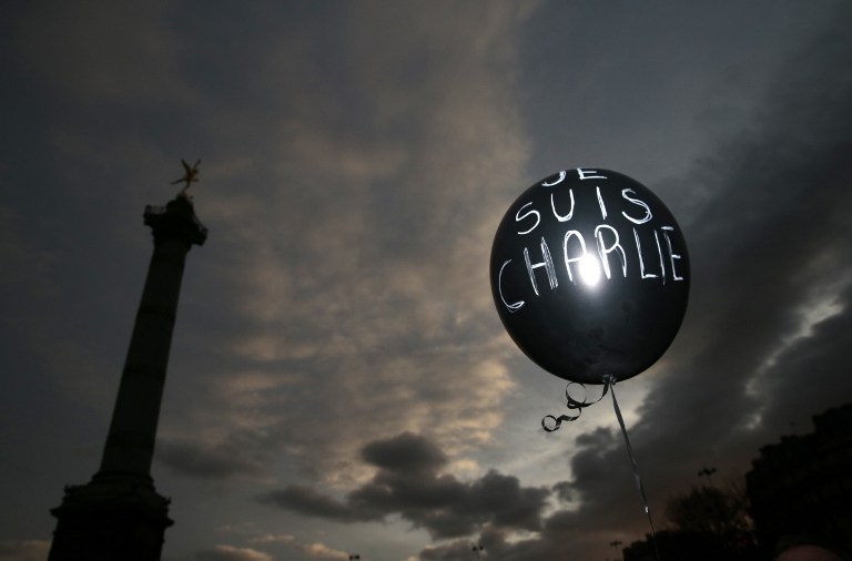 A balloon reading 'Je suis Charlie' is held at Place de la Bastille in Paris on January 11, 2015 A balloon reading 'Je suis Charlie' is held at Place de la Bastille in Paris on January 11, 2015