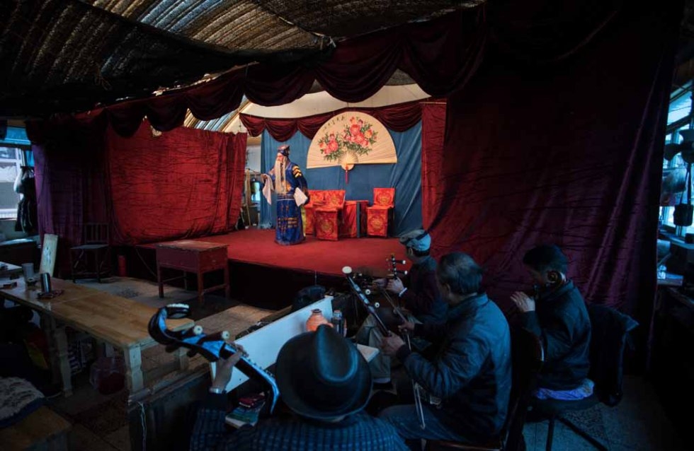 Musicians play as Flower Lantern actors perform. Musicians play as Flower Lantern actors perform.