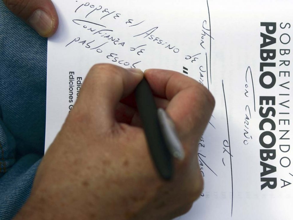 Popeye signs a book about Escobar with 'Popeye, Escobar's trusted assassin." December, 2015. Popeye signs a book about Escobar with 'Popeye, Escobar's trusted assassin." December, 2015.