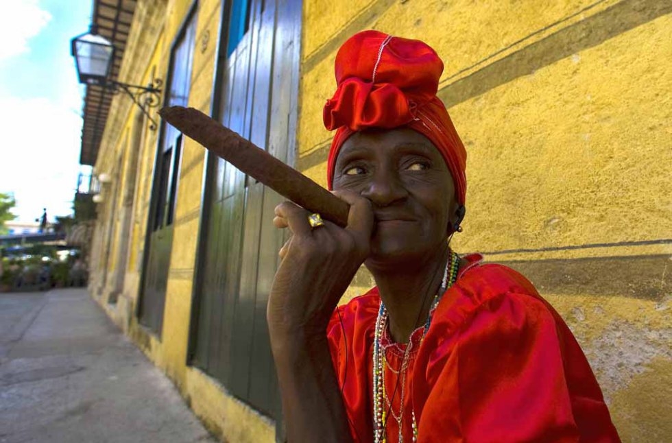 A Cuban and her cigar. Havana, February 2008. A Cuban and her cigar. Havana, February 2008.