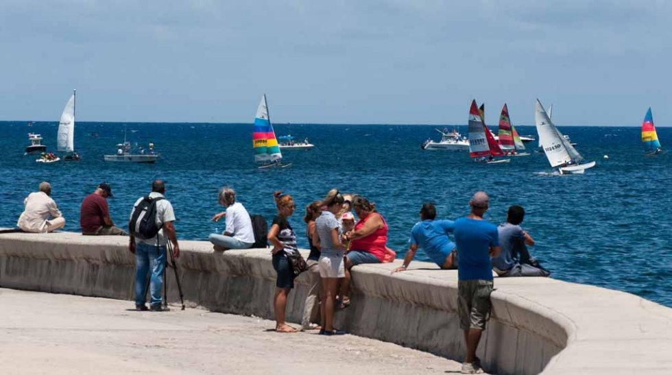 People watch a regatta from the Malecon, May, 2015. People watch a regatta from the Malecon, May, 2015.