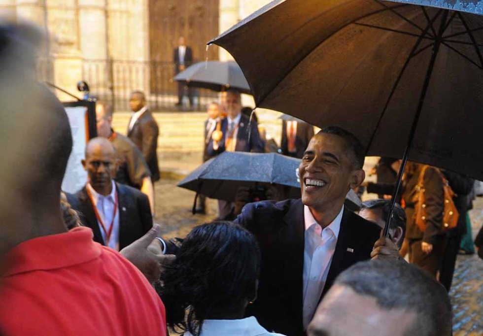 Obama greets tourists and Cubans outside the Havana Cathedral on March 20, 2016. Obama greets tourists and Cubans outside the Havana Cathedral on March 20, 2016.