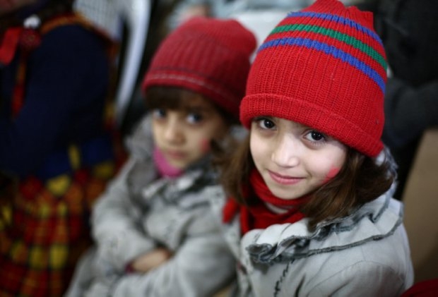 Orphaned Syrian children at a party held by an NGO in the besieged rebel bastion of Douma Orphaned Syrian children at a party held by an NGO in the besieged rebel bastion of Douma