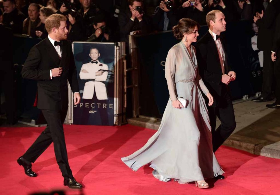 The royal trio of Harry, William and Kate, brush past the photographers' pen without a glance. The royal trio of Harry, William and Kate, brush past the photographers' pen without a glance.