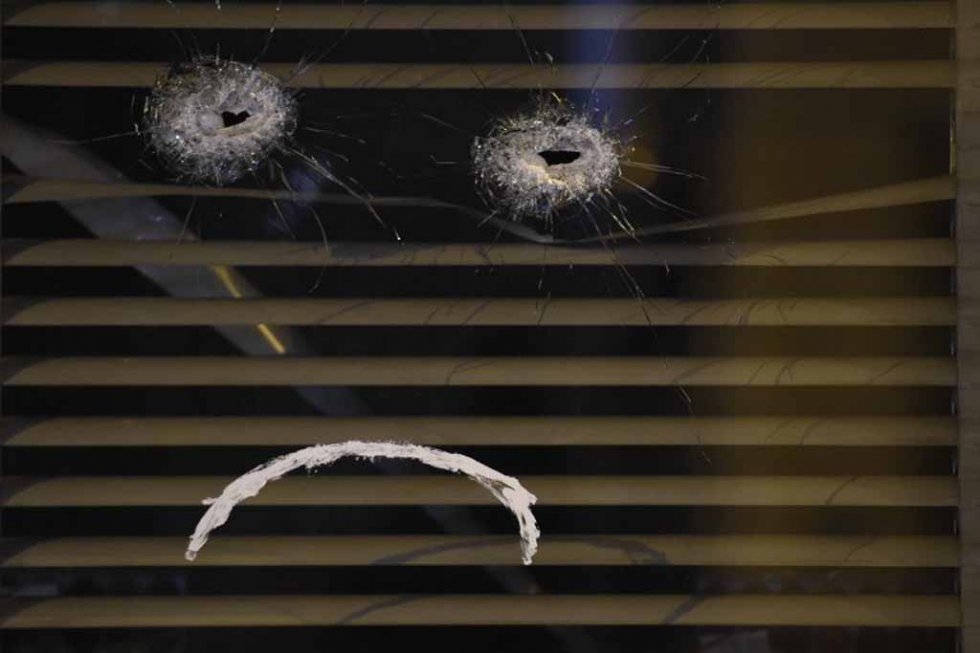 Windows of the Belle Equipe restaurant a day after the attacks. Windows of the Belle Equipe restaurant a day after the attacks.