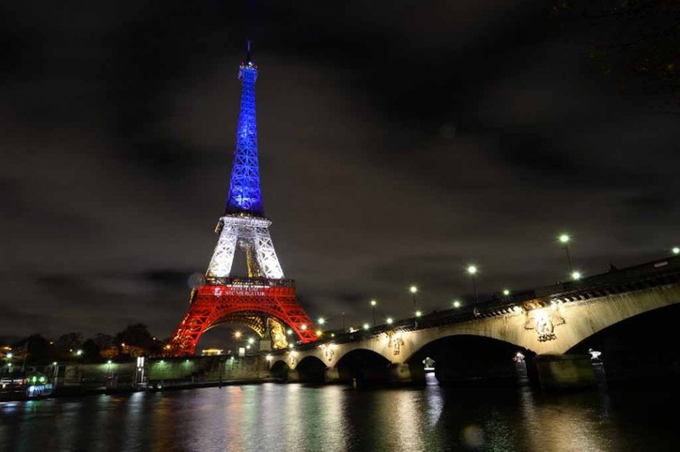 The Eiffel Tower lit up in the French tricolor in the days following the attacks. The Eiffel Tower lit up in the French tricolor in the days following the attacks.