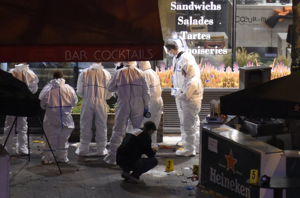 Forensic experts inspect the site of the attacks. Forensic experts inspect the site of the attacks.