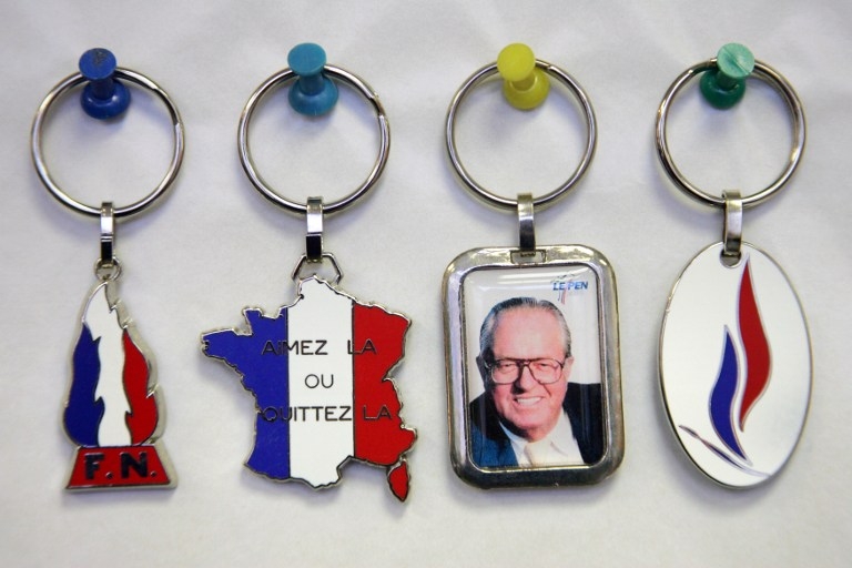 National Front keyrings, one of them reading: 'France, love it or leave it!', in 2006 National Front keyrings, one of them reading: 'France, love it or leave it!', in 2006