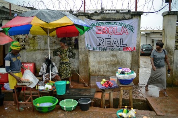 A sign warning of the dangers of ebola outside a hospital in Freetown on August 13, 2014 A sign warning of the dangers of ebola outside a hospital in Freetown on August 13, 2014