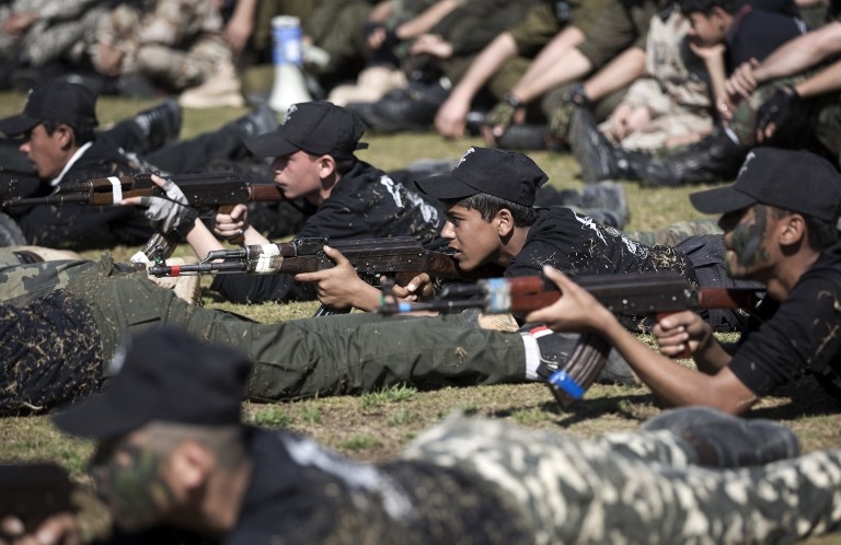 A graduation ceremony for a Hamas-run youth training camp on January 29, 2015 in Gaza City A graduation ceremony for a Hamas-run youth training camp on January 29, 2015 in Gaza City
