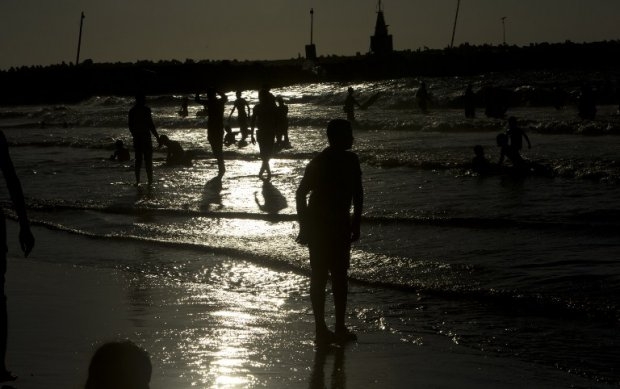 Families on the beach in Gaza City on September 7, 2014 Families on the beach in Gaza City on September 7, 2014