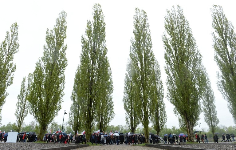 Visitors at the memorial site of the Nazi concentration camp Dachau on May 3, 2015 Visitors at the memorial site of the Nazi concentration camp Dachau on May 3, 2015