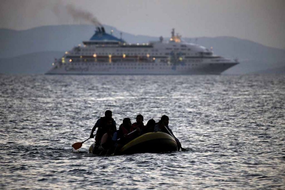 A migrant dinghy arrives in Kos. August, 2015. A migrant dinghy arrives in Kos. August, 2015.