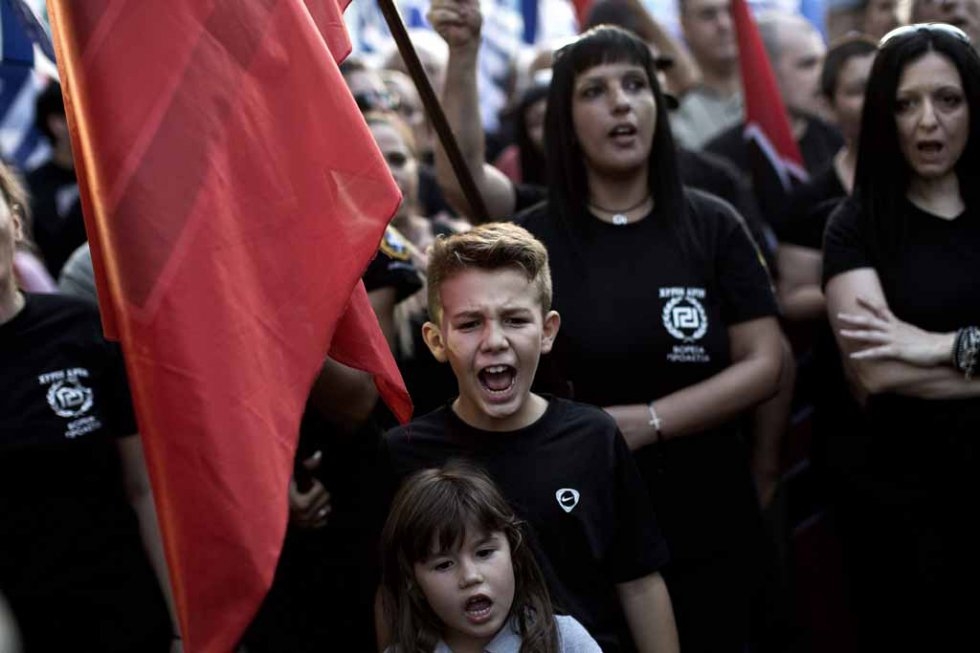 Supporters of the far-right group Golden Dawn at an Athens rally. September, 2015. Supporters of the far-right group Golden Dawn at an Athens rally. September, 2015.