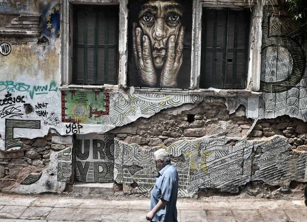 Graffitti referring to Greece's possible exit from the euro in Athens on June 28, 2015 Graffitti referring to Greece's possible exit from the euro in Athens on June 28, 2015