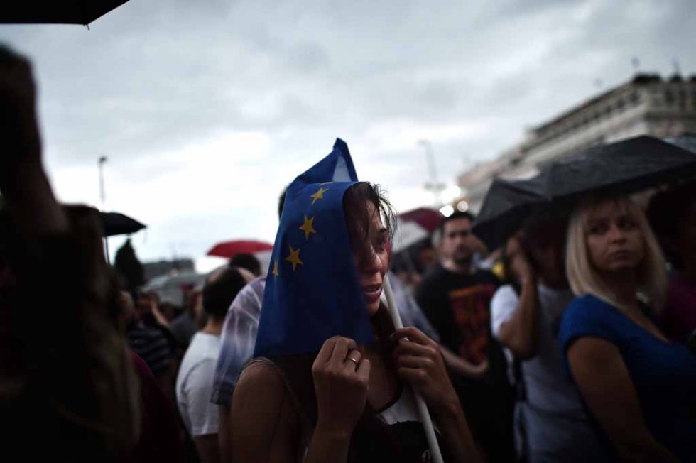A pro-European Union demonstrator in front of the parliament in Athens on June 30, 2015 A pro-European Union demonstrator in front of the parliament in Athens on June 30, 2015
