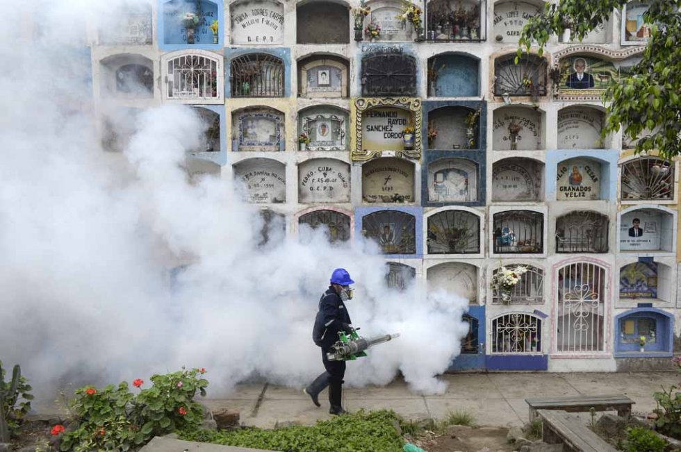 A graveyard is fumigated in Peru in an effort to prevent the spread of the Zika virus. January, 2016. A graveyard is fumigated in Peru in an effort to prevent the spread of the Zika virus. January, 2016.