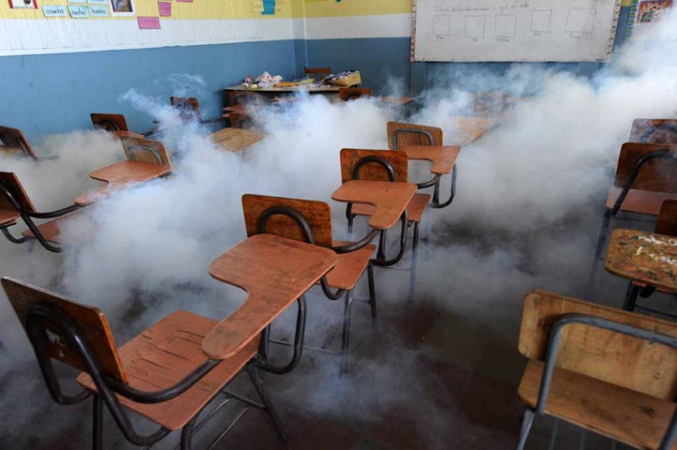 A classroom is fumigated against mosquitoes in Honduras. February, 2016. A classroom is fumigated against mosquitoes in Honduras. February, 2016.