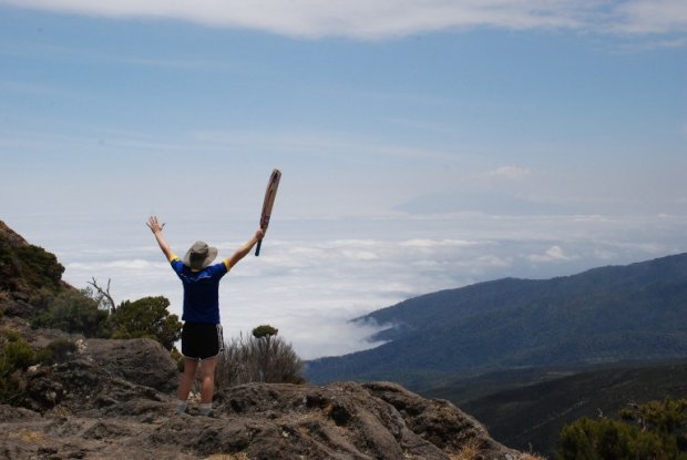England women national cricket team vice captain Heather Knight raises her arms on the second day of a trek up to Kilimanjaro, on September 21, 2014 England women national cricket team vice captain Heather Knight raises her arms on the second day of a trek up to Kilimanjaro, on September 21, 2014